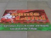 Sidewalk graphics used for directional purposes leading to Santa Land at an open air mall.